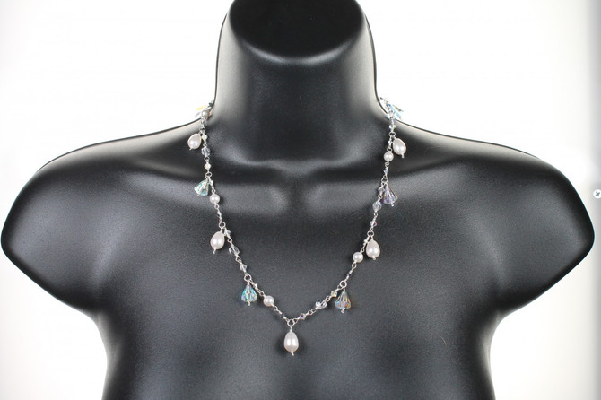 Handmade with SWAROVSKI ELEMENTS, can also be worn as a Y necklace. Crystal drops date back to the 1930's.