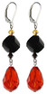 An elegant statement for Halloween. these earrings adorned with rare and dazzling Swarovski crystals in vibrant orange and black with a yellow accent adding a touch of  elegance to your festive look.
