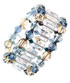 Soft hues of tan and blue with clear crystal create a stunning cuff bracelet
