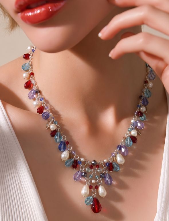 Luxury Swarovski crystal necklaces handcrafted in New York City by jewelry designer Karen Curtis using fine metals and brilliant limited edition crystal designs.
