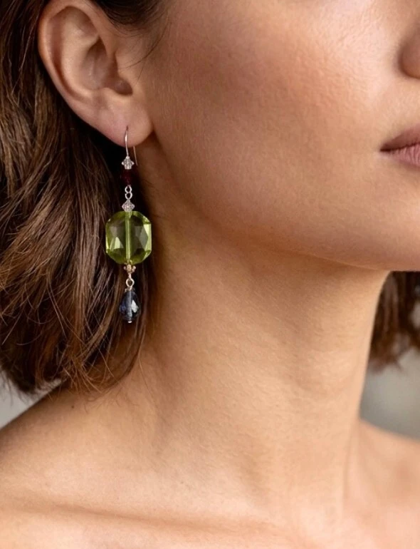 Sparkling Swarovski crystal earrings handcrafted in New York City by Karen Curtis featuring elegant drop earrings, hoop earrings and statement crystal jewelry.