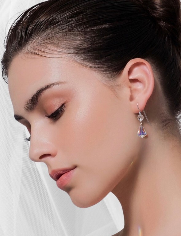 Sparkling Swarovski crystal earrings handcrafted in New York City by Karen Curtis featuring elegant drop earrings, hoop earrings and statement crystal jewelry.