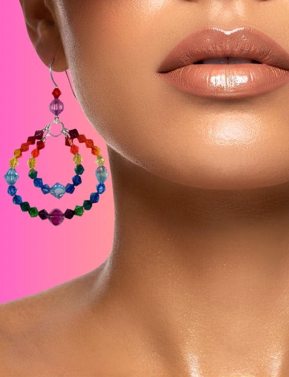 Sparkling Swarovski crystal earrings handcrafted in New York City by Karen Curtis featuring elegant drop earrings, hoop earrings and statement crystal jewelry.