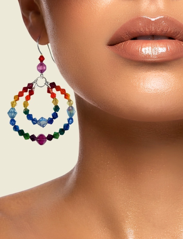 Sparkling Swarovski crystal earrings handcrafted in New York City by Karen Curtis featuring elegant drop earrings, hoop earrings and statement crystal jewelry.