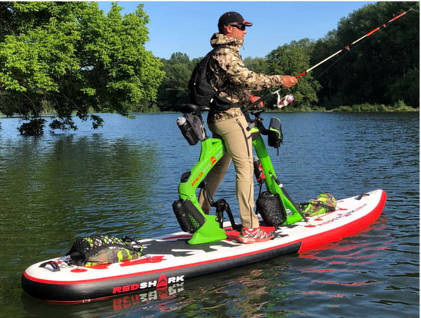 Inflatable_Red_Shark_In_Action: A dynamic shot of the inflatable Red Shark water bike in use, highlighting its impressive stability and high-quality construction.