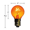 An orange incandescent light bulb with a round G-style globe and an E12 candelabra screw base. The bulb measures approximately 1 5/8 inches in height and 1 inch in diameter, and the glowing filament is clearly visible inside the transparent colored glass.
