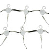 A stunning 10' x 30' warm white LED light curtain is gracefully displayed, with 3,600 tiny glowing lights cascading down in evenly spaced rows. The warm white light creates a soft, inviting ambiance, ideal for festive events or cozy décor. The expansive size provides a dramatic effect, covering a large walls, windows, or outdoor spaces. The gentle glow of the LEDs beautifully illuminates the surroundings, offering a magical, twinkling backdrop perfect for any occasion.