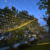 A stunning 10' x 30' warm white LED light curtain is gracefully displayed, with 3,600 tiny glowing lights cascading down in evenly spaced rows. The warm white light creates a soft, inviting ambiance, ideal for festive events or cozy décor. The expansive size provides a dramatic effect, covering a large walls, windows, or outdoor spaces. The gentle glow of the LEDs beautifully illuminates the surroundings, offering a magical, twinkling backdrop perfect for any occasion.