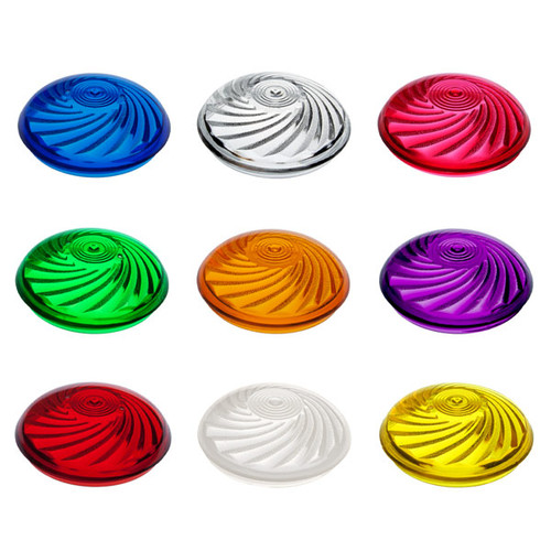 This image displays a variety of colorful cabochon fixture caps arranged in a circular pattern, each with a swirl design on its surface. The caps come in multiple translucent colors including orange, red, pink, green, blue, yellow, purple, and clear, designed for the carnival and amusement lighting effects.