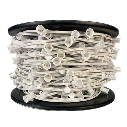 In the image, a string of lights with C9 sockets is skillfully arranged, creating a mesmerizing and inviting atmosphere. The sockets are evenly spaced at regular intervals, displaying a sense of precision and aesthetic harmony. The choice of white for the socket sets imparts an elegant and classic touch to the scene.

Each socket is designed to hold C9 bulbs, which emit a soft and gentle glow. The white sockets beautifully complement the accompanying C9 bulbs, resulting in a cohesive and enchanting lighting display that exudes a serene and calming ambiance.

The picture highlights the versatility of the ready-made string light set, which can be effortlessly hung or draped in a variety of indoor and outdoor settings. The white lights bring a sense of purity and elegance, making them perfect for creating a magical atmosphere for weddings, special occasions, or even for adding a touch of sophistication to everyday spaces.

The image may depict the string lights connected to a power source, emphasizing the convenience of the ready-made set. The power cord, designed for safety and practicality, ensures a reliable electrical connection to power the white C9 bulbs, illuminating the surroundings with a soft and radiant glow.

Overall, the picture captures the delightful allure of the C9 Various Spacing, Various Color Ready Made String Light Socket Sets in white. The arrangement, coupled with the white color, creates a captivating and serene scene, making them an excellent choice for enhancing the ambiance and creating a charming atmosphere in any setting.