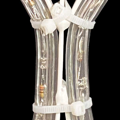 The image showcases the intricate texture of the rope light material, which appears sleek and flexible, ready to be shaped into various forms of illumination. The pure white color exudes a sense of purity and elegance, creating a clean and sophisticated aesthetic. Within the rope light, tiny LED bulbs emit a soft and radiant illumination, casting a warm and inviting ambiance. This close-up photo invites you to appreciate the intricate craftsmanship and the magical allure of white rope lights, a versatile and captivating lighting option for any occasion or décor. The image showcases the intricate texture of the rope light material, which appears sleek and flexible, ready to be shaped into various forms of illumination. The pure white color exudes a sense of purity and elegance, creating a clean and sophisticated aesthetic. Within the rope light, tiny LED bulbs emit a soft and radiant illumination, casting a warm and inviting ambiance. This close-up photo invites you to appreciate the intricate craftsmanship and the magical allure of white rope lights, a versatile and captivating lighting option for any occasion or décor.