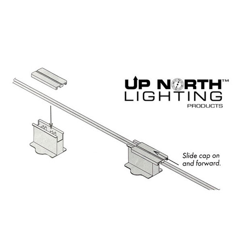 Black and white instructional diagram showing how to assemble an inline vampire plug from Up North Lighting Products. A zip cord is inserted into the connector base, and a sliding cap is positioned to be pushed forward to pierce the wire insulation. Text reads “Slide cap on and forward.” Black and white instructional diagram showing how to assemble an inline vampire plug from Up North Lighting Products. A zip cord is inserted into the connector base, and a sliding cap is positioned to be pushed forward to pierce the wire insulation. Text reads “Slide cap on and forward.”