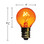 An orange incandescent light bulb with a round G-style globe and an E12 candelabra screw base. The bulb measures approximately 1 5/8 inches in height and 1 inch in diameter, and the glowing filament is clearly visible inside the transparent colored glass.