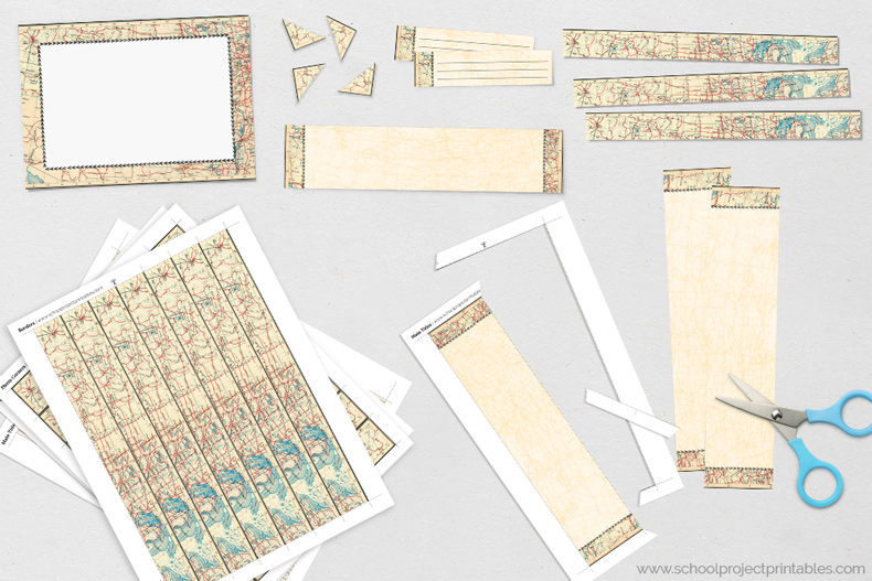 Templates and clip art of old, weathered paper with burnt edges for Age of Exploration displays. Printable kit. Pieces of the kit with old map graphics cut out on a table