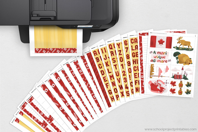 Canada kit pages feeding out of a black printer