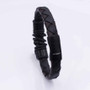 Bracelete 22cm couro trançado preto/marrom centro trabalhado fecho black