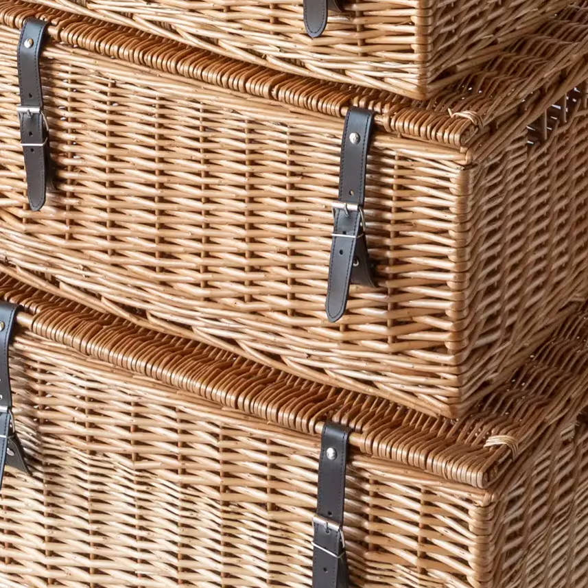 A close up of three wicker baskets