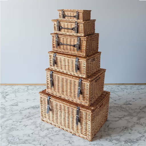 Six hampers on top of each other, largest at the bottom, smallest at the top