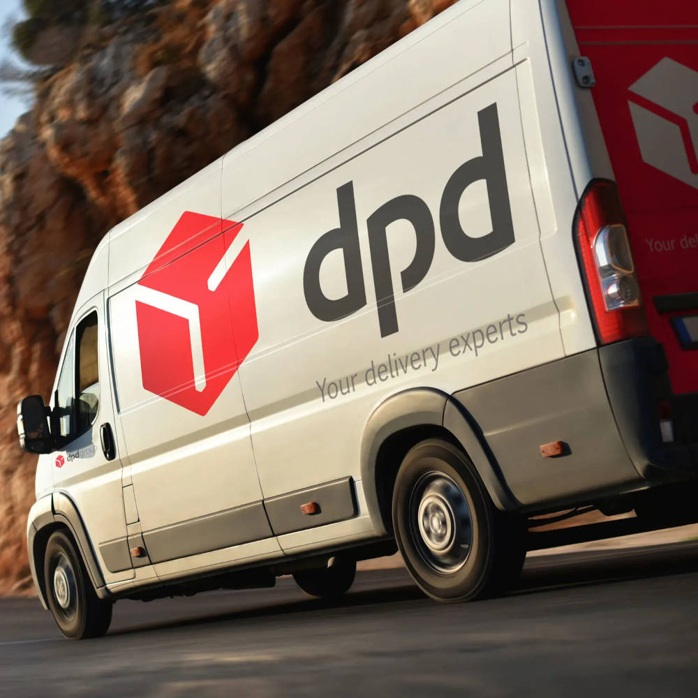 A DPD van driving on a road