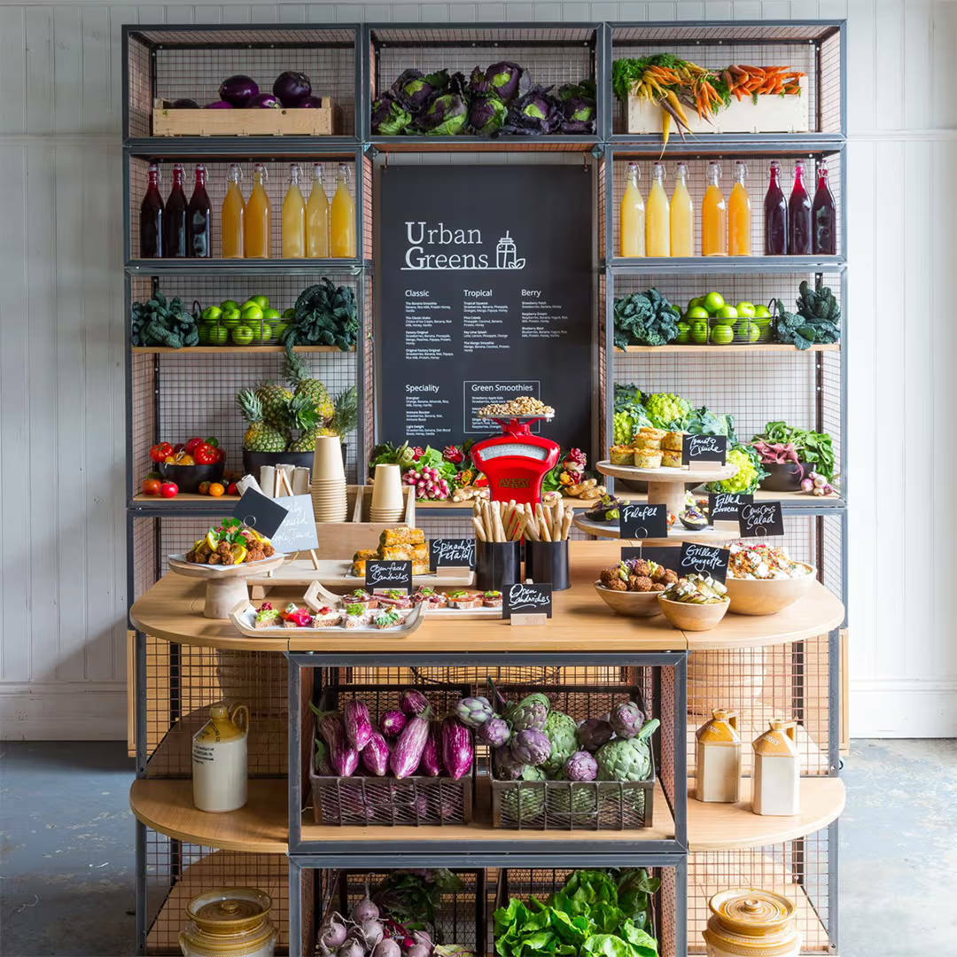 Fruit on display below and above a table construct