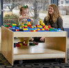 Playscapes 3branch Discovery Mini Children's Activity Table, children playing with colorful building blocks. Playscapes 3branch Discovery Mini Children's Activity Table, children playing with colorful building blocks.
