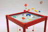 Playscapes Play-From-The-Top Healthy Race Activity Table, children’s activity table with a glass top and colorful blocks and balls.