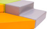 Moje Bambino Megaform II Soft Play Platform Set, colorful cushioned play structure for children with soft, padded surfaces in vibrant orange, green, and gray colors.