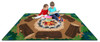 Playscapes Campfire Fun Carpet, children sitting on a themed play carpet with a campfire and logs design, kids reading books.