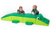 Moje Bambino Sensory Crocodile Soft Play Cushion, children playing on a bright green crocodile-shaped soft play mat. Moje Bambino Sensory Crocodile Soft Play Cushion, children playing on a bright green crocodile-shaped soft play mat.