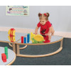 Whitney Brothers Quarter Round Infant Floor Mirror, young girl playing with colorful toys on a mirrored play table