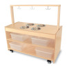 Whitney Brothers Mobile Sensory Play Kitchen, wooden sensory play kitchen with metal bowls and hanging hooks, on wheels with storage bins.