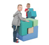 Novum Mini Build-A-Cube Puzzle Soft Blocks, children playing with colorful soft foam building blocks.
