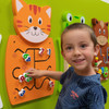 SPARK & WOW Counting Cat Activity Wall Panel Toy, colorful interactive wall panel with numbered beads and shaped cat face for kids' educational play.