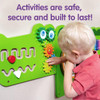 SPARK & WOW Crocodile 5-Activity Sensory Wall Panel, child interacting with colorful gears and sensory activities on a green wall panel. SPARK & WOW Crocodile 5-Activity Sensory Wall Panel, child interacting with colorful gears and sensory activities on a green wall panel.