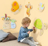 HABA Pro Butterfly Interactive Wall Decor, colorful wooden butterfly and bug wall art with plush touch accents for children's playroom.