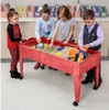 Childbrite Sand and Water Activity Center w/Casters, children playing with sand and water toys in a classroom setting.