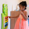 SPARK & WOW Frog Activity Wall Panel Toy, a green fun educational wall panel with colorful beads for children to slide and develop motor skills.