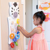SPARK & WOW Zebra Activity Wall Panel Toy, a colorful educational children's toy with wooden blocks and rings on a wall, designed for kids to engage and develop fine motor skills.