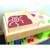 Whitney Brothers Sand Box For Kid's Light Tables, Wooden sandbox with red sand and a white spiral design, paired with a white light table with colorful circles, suitable for children's educational activities.