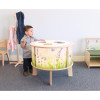 Whitney Brothers Nature View Radiant LED Light Table, children playing with educational wooden table decorated with nature-themed illustrations.