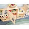 Whitney Brothers Let's Play Toddler Kitchen Play Set - Natural, children's wooden toy kitchen set with stove, sink, and storage shelves with toy fruits and vegetables.