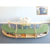 Whitney Brothers Nature View Straight Couch, a wooden children’s couch with green cushioning and built-in shelves underneath, designed for kids' playrooms or classrooms.