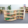 Whitney Brothers Nature View Serenity Curve In Storage Cabinet, child-friendly wooden storage unit with curved design, multiple open shelves, featuring woodland-themed backdrop, used for organizing toys and educational materials in a classroom setting.