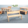Whitney Brothers Nature View Live Edge Kid's Bench 10 H, wooden children's bench with natural live edge finish in a room with blue walls and large window.