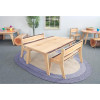 Whitney Brothers Nature View Live Edge Rectangle Table 20" H, wooden children's table with a natural wood finish and live edge design, placed on a rug in a bright playroom with natural light.