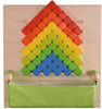 HABA Pro Dice Sensory Wall Toy, colorful tactile sensory wall with rotating dice in red, orange, yellow, green, and blue arranged in a rainbow pattern on a wooden board with a green storage pocket.