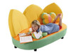 HABA Pro Blossom Flower Couch for Kids, colorful children's sofa with floral and petal design, featuring a sleeping child using it as a bed.