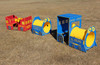 Infinity Playgrounds Infinity Express Choo Choo Outdoor Climber, colorful train-themed children's outdoor playground equipment on grass.
