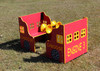 Infinity Playgrounds Infinity Express Caboose Outdoor Climber, colorful children's play structure designed to resemble a train caboose with windows and wheels, intended for outdoor play areas.