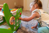 SPARK & WOW Crocodile Toddler Activity Walker, child playing on a green crocodile-themed activity walker with colorful interactive elements. SPARK & WOW Crocodile Toddler Activity Walker, child playing on a green crocodile-themed activity walker with colorful interactive elements.